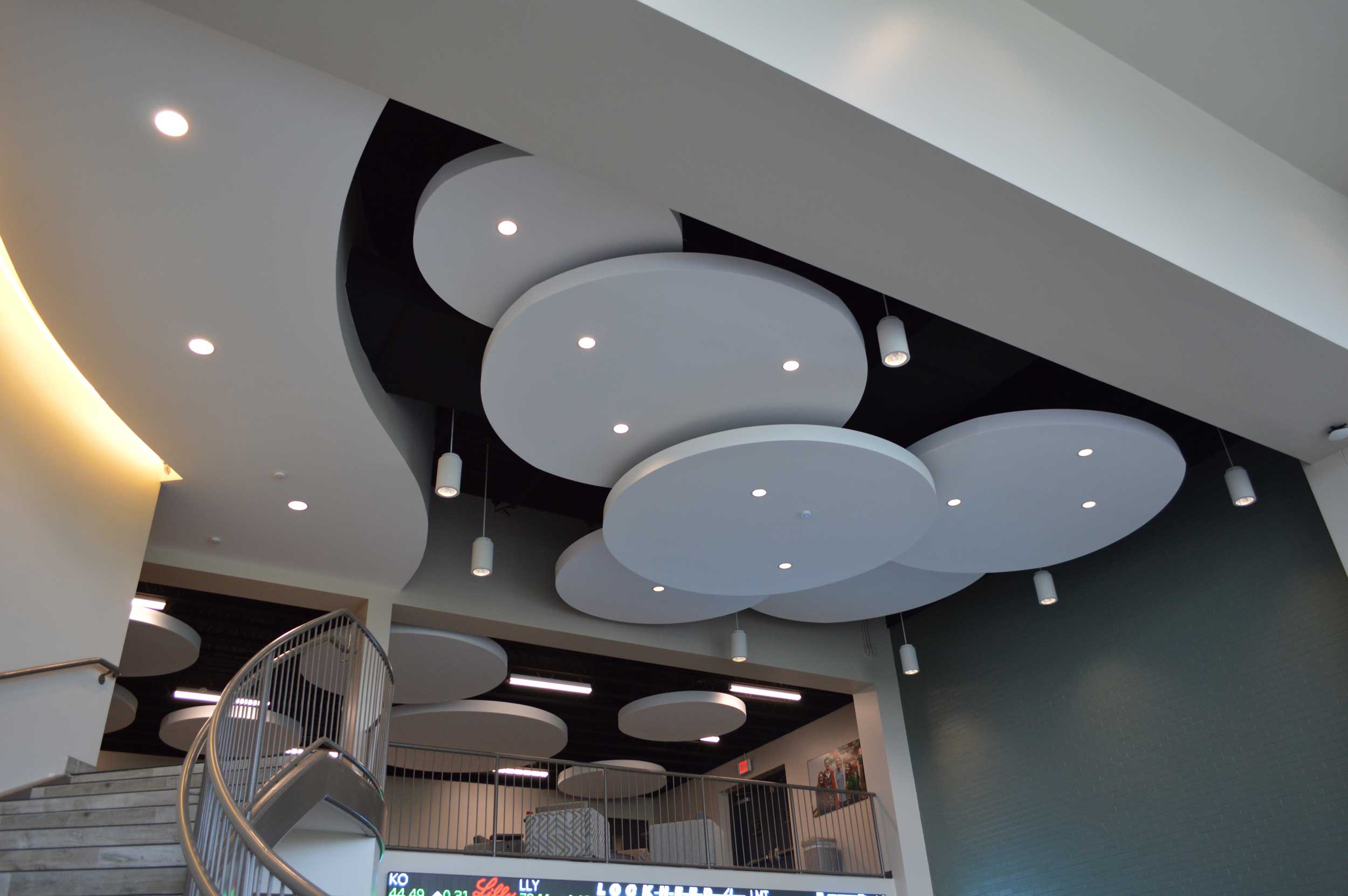 multi tiered light installation on the ceiling