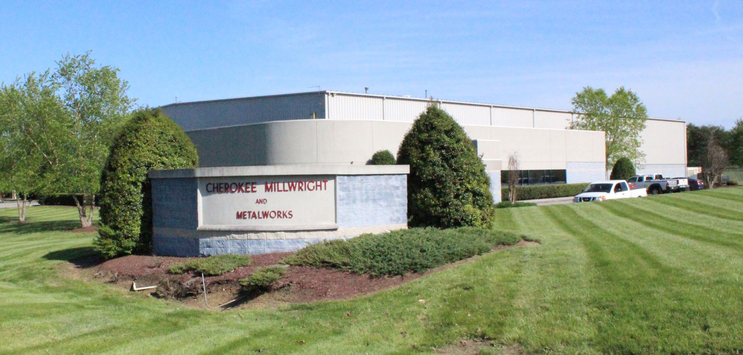 Cherokee Millwright and Metalwords sign next to the building